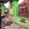Salah satu coretan Save Ciremai terpampang ditembok sekolah.